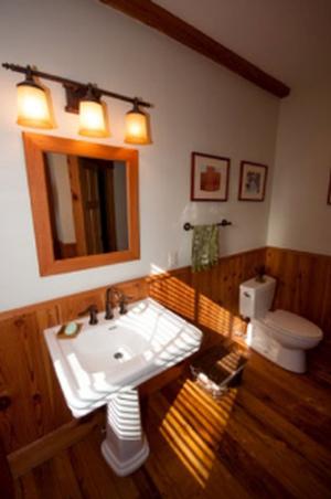 Bathroom with reclaimed wood trim and floor